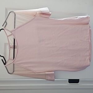 Pink shirt with mesh sleeves and upper back